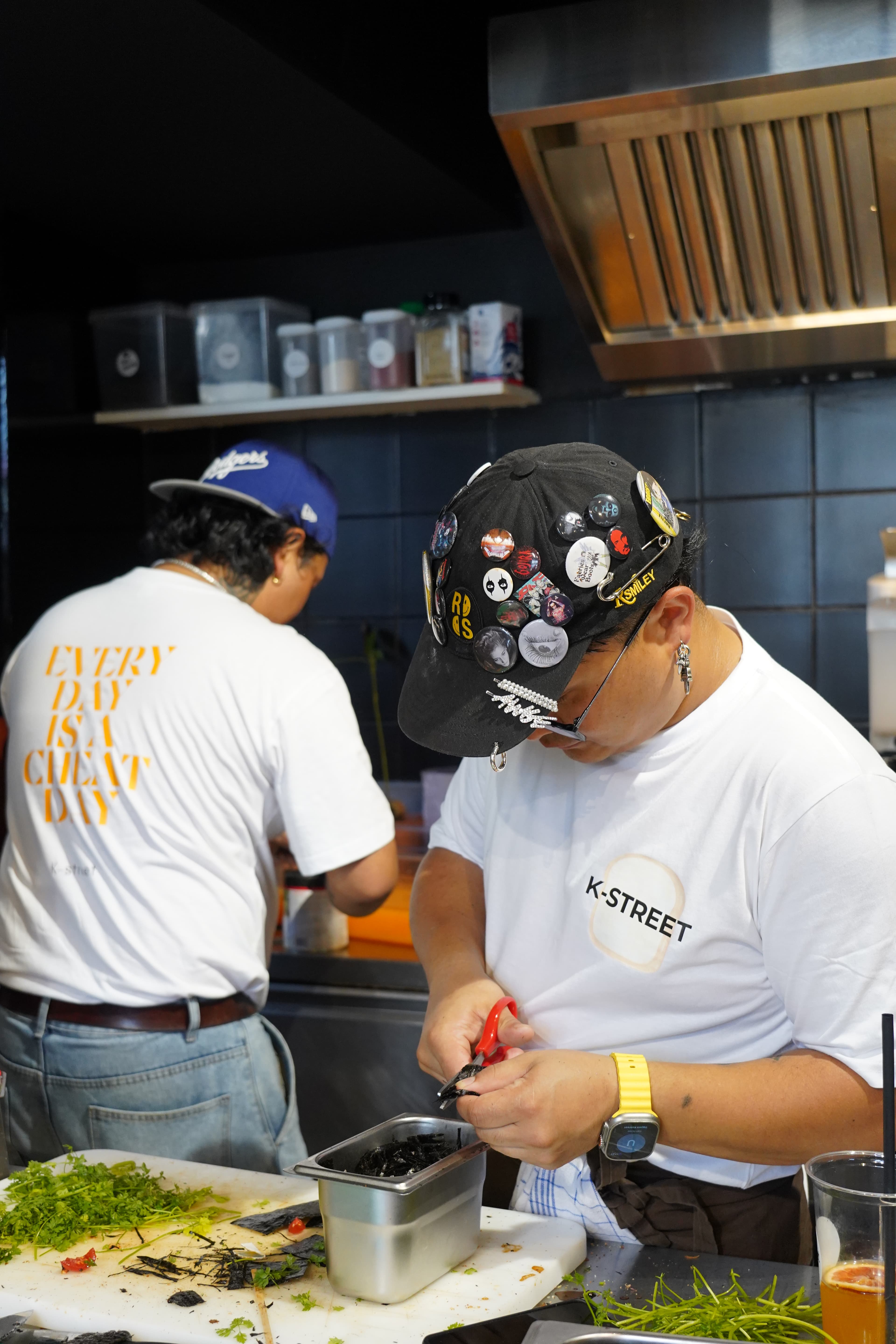 Prepping toasts behind the K-STREET counter