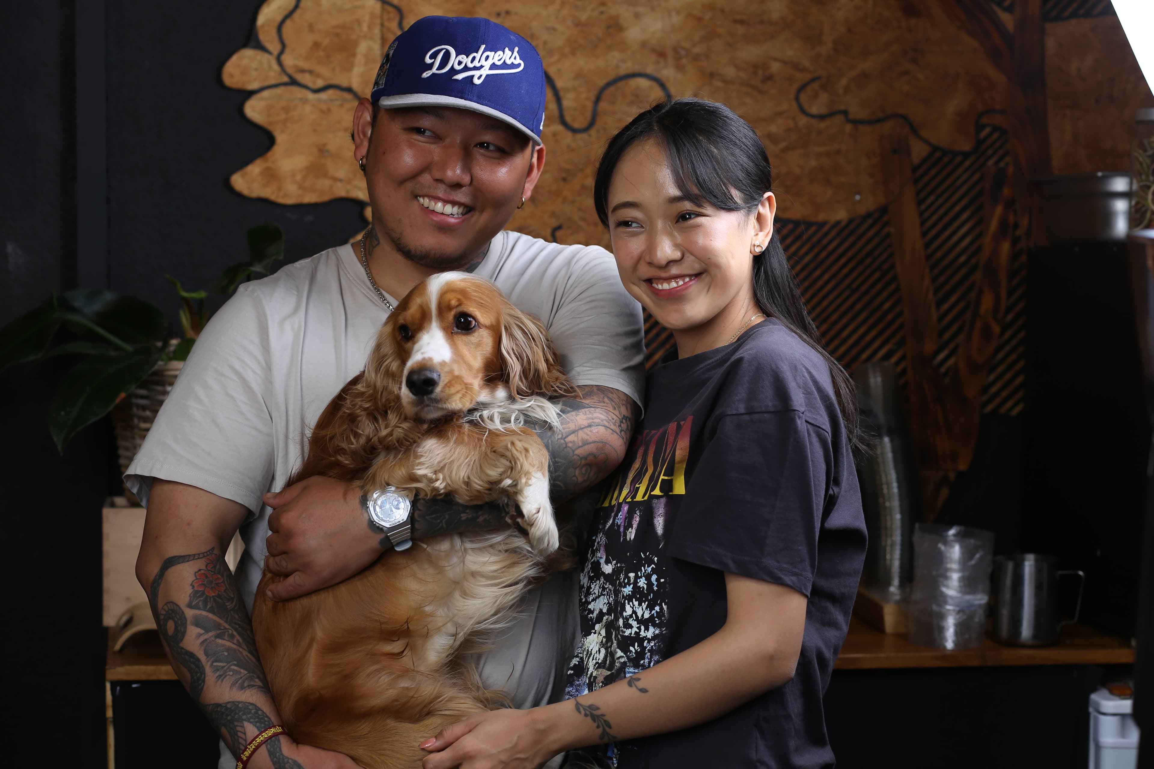 Founders Tenzin and Ugyen with their dog in the K-STREET shop