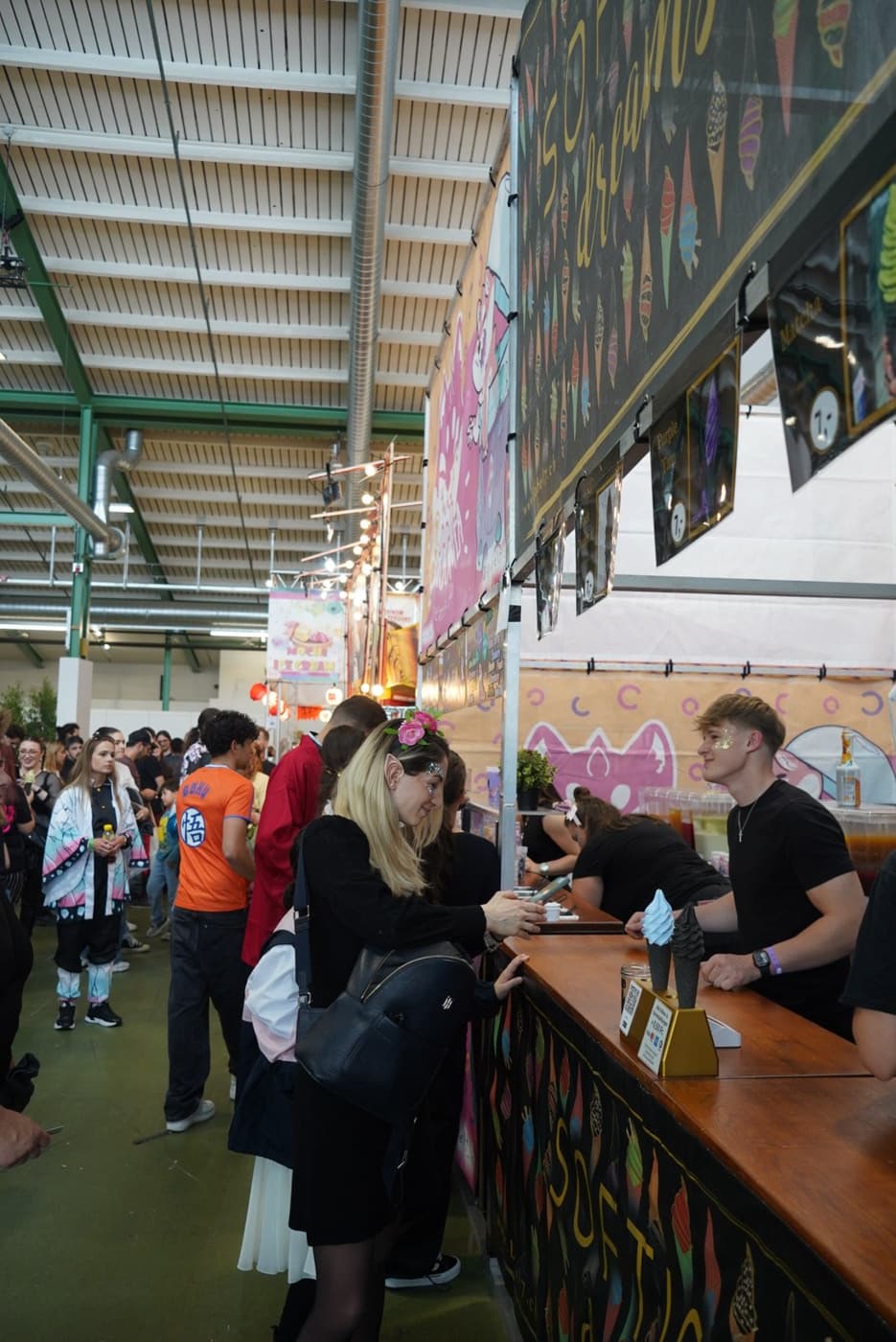 K-STREET counter at a busy indoor food festival